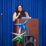 Sky Barron, Senior Vice President of Product at Trademark Engine, speaks at the podium during Social Media Day Houston 2026