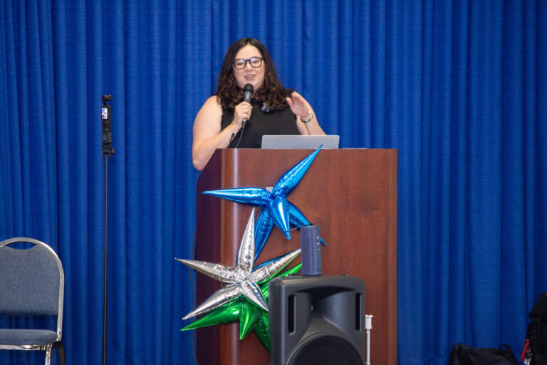 Sky Barron, Senior Vice President of Product at Trademark Engine, speaks at the podium during Social Media Day Houston 2026